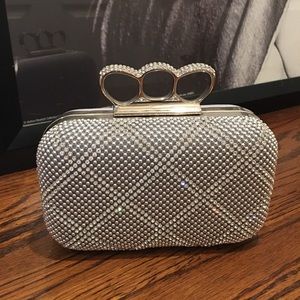 Elegant Silver Clutch with Knuckle Handle